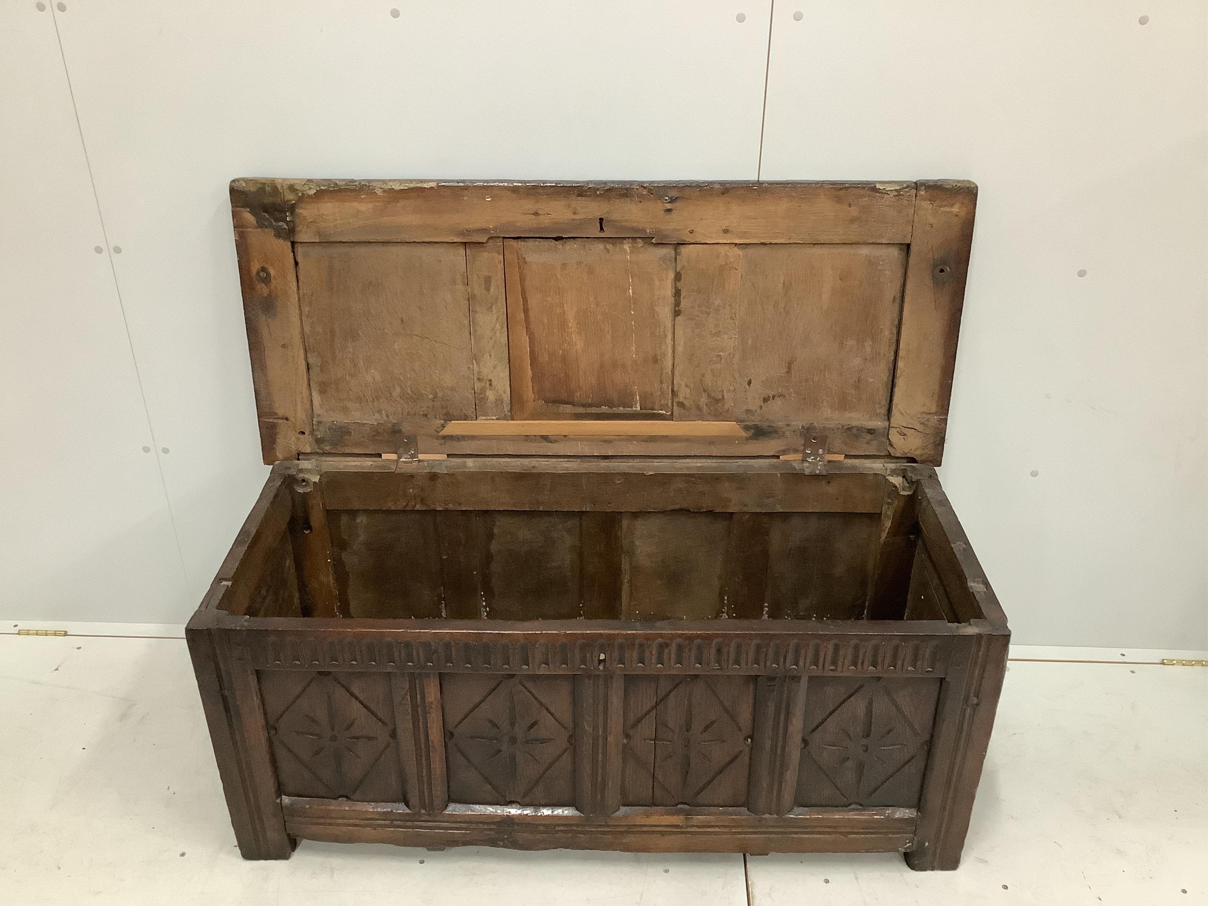 An early 18th century and later oak coffer, width 132cm, height 58cm. Condition - poor